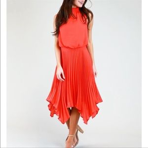 Orange pleated midi dress